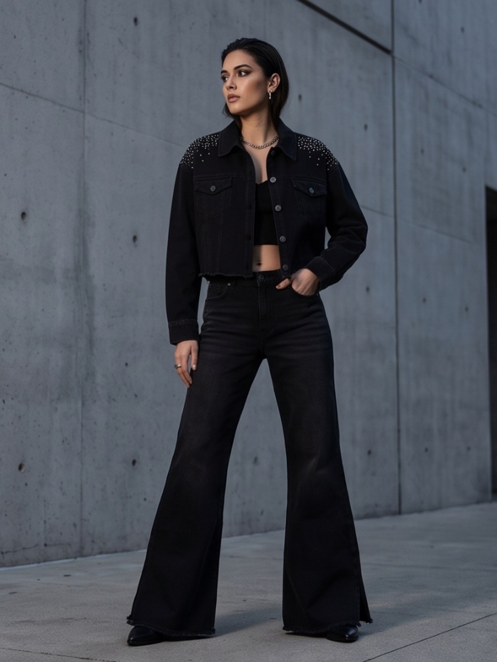 This edgy-chic black denim set combines classic denim with glamorous details.